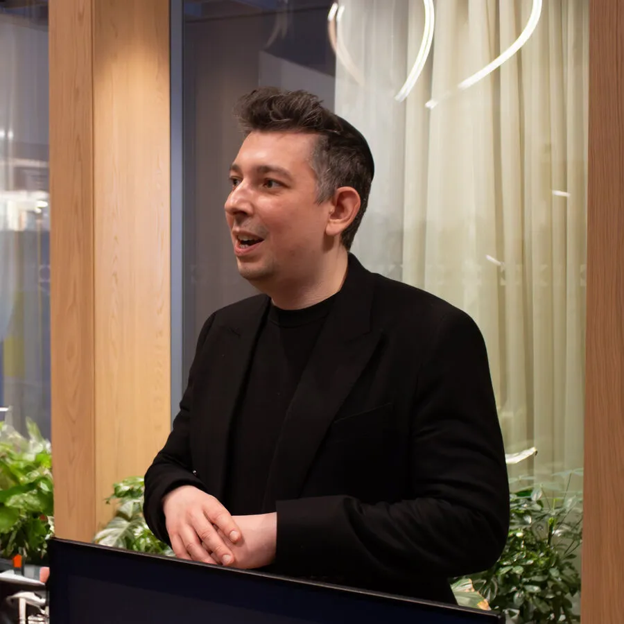 Alex Halchenko speaking at an event
